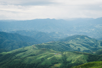 Fototapeta na wymiar Mountain landscape talking from Doi Chang Moob, Chiang Rai, Thailand.