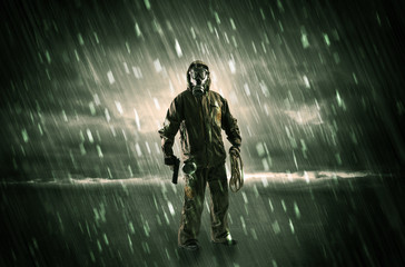 Terrorist in a room with weapons on his hand