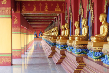 Many gold buddha statue Bang Tong Temple Krabi Thailand