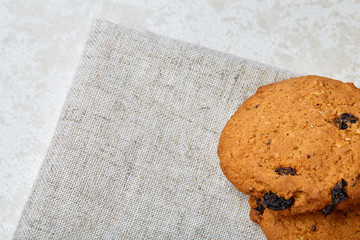 Chocolate chips cookies isolated on light background, macro, close-up, shallow depth of field, selective focus