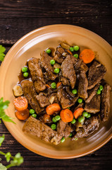 Pork medallions with vegetable and soy garlic sauce