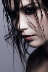 Close-up portrait of young brunette woman