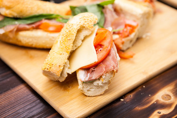Close up on homemande sandwiches on wooden background
