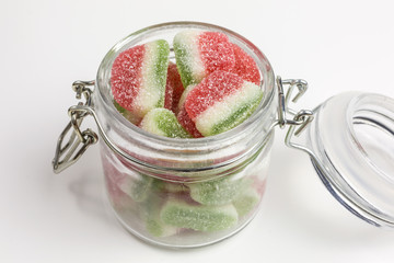 watermelon gummy candy in a glass jar