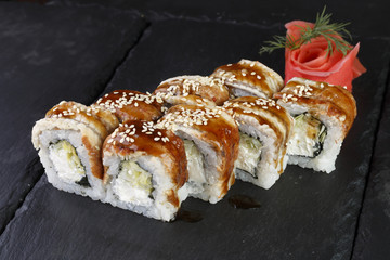 Roll with an eel on a dark background