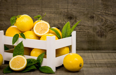 Fresh lemons in the crate