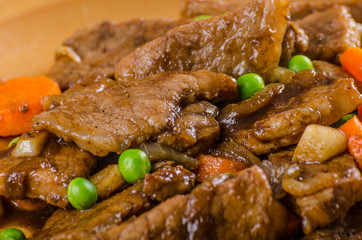 Pork medallions with vegetable and soy garlic sauce