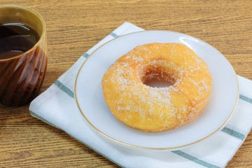 Glazed Donut with Sugar Served with Tea