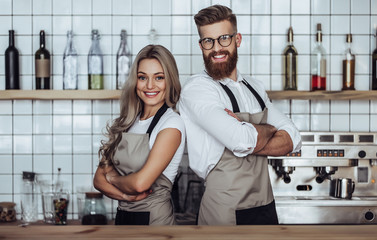 Couple of barista in coffee shop