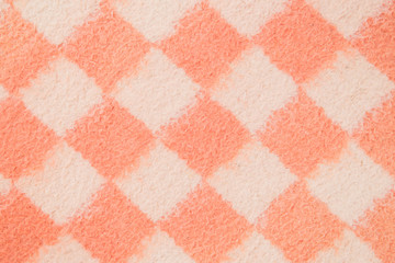 Background of felt fabric: white and pink squares.