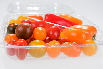 Mini vegetable mix with peppers and cherry tomatoes in plastic box