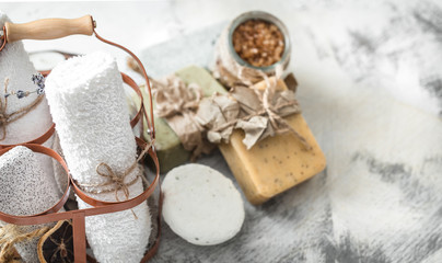 Spa composition with handmade soap in a beautiful stand on a light background