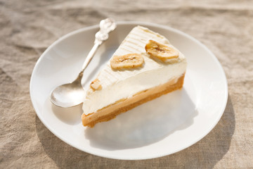 Delicious banana cake on table