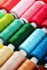 Fototapeta na wymiar Background of colourful thread spools