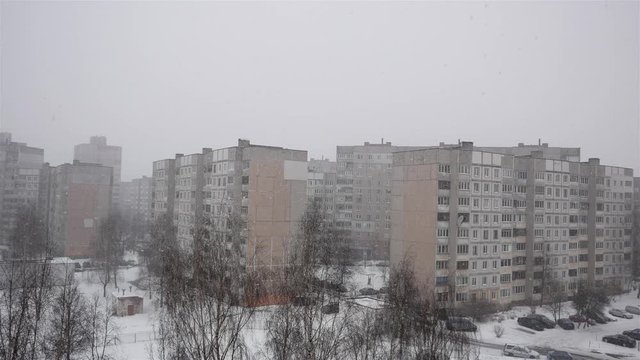 residential microdistrict is falling snow. a lot of big snowflakes blizzard