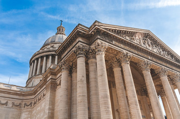 Low level view on Pantheon with its columns, front porch and dome in Paris. Former church, later mausoleum and burial place of distinguished French citizens.