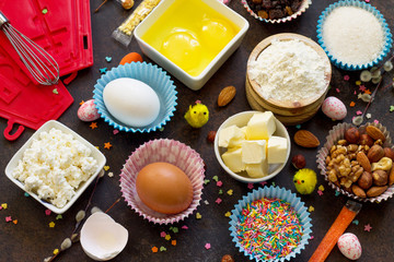 Ingredients for Easter baking - cottage cheese, nuts, eggs, flour, yeast, butter, raisins and sugar.