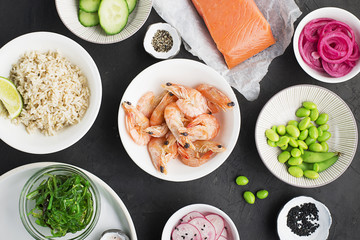 Fresh ingredients for poke bowl. Top view.