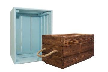 Old wooden crates, light blue and dark color isolated on white background.