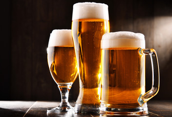 Composition with three glasses of lager beer