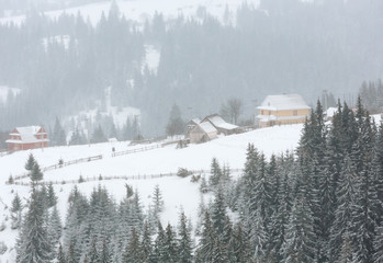 Early morning winter mountain village landscape