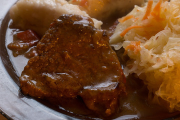czech dumplings, sour cabbage and stew beef