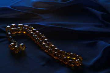 Ramadan Karim greeting background Islamic prayer bead (rosary). Ramadan Kareem beautiful poster, banner, postcard for the celebration of the festival of the Muslim community