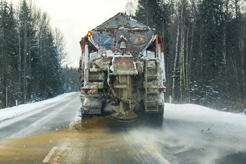 a snowplow on the highway