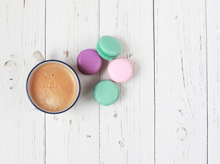 Macaron or macaroon on white background, colorful almond cookies with different filling. Selective focus