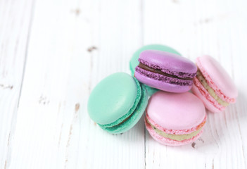 Macaron or macaroon on white background, colorful almond cookies