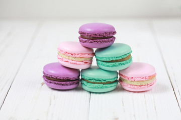 Macaron or macaroon on white background, colorful almond cookies