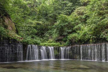 Shiraito Falls (Shiraito-no-taki) 3 Meters height waterfall but spread out over a 70 meter wide arch. Located north of Karuizawa, Shizuoka Prefecture, near Mount Fuji, Japan