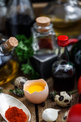 Big set of sauces and spices, with vegetables
