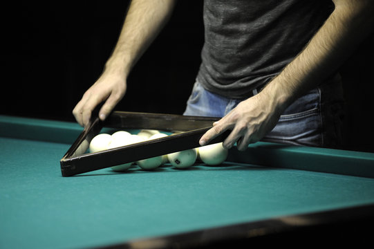 Billiard: setting up the balls for the beginning of a game