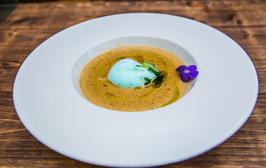 Food on a plate, on a wooden background.Food detail