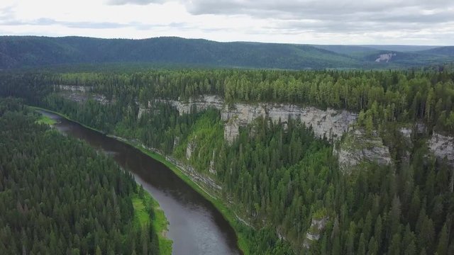 Gorgeous aerial panoramic view on the touristic part of the river at sunset. Clip. Beautiful natural landscape at summer. Europe