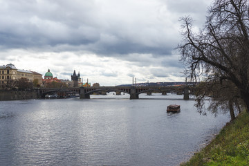 Vltava river panoramic view with lonely boat in Prague, Czech Republic