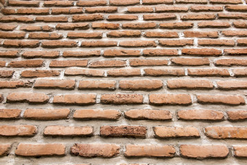 brick wall with a large layer of mortar