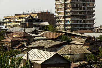 A cluster of old poor buildings near the cathedral in the capital of Armenia Yerevan