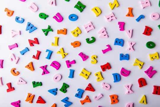 Scattered colorful wooden letters