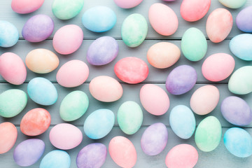 Fototapeta na wymiar Pastel Easter eggs background. Spring greating card.