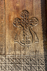 A fragment of an old wooden door in the monastery