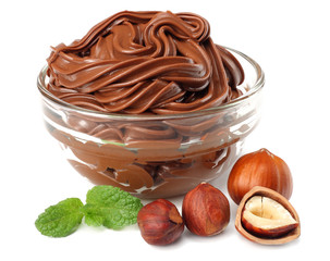 chocolate cream with hazelnut isolated on white background. cream in glass bowl