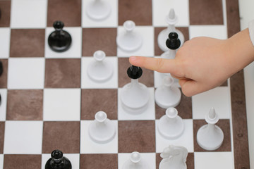 game of chess on a board, gambling game