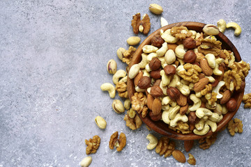 Assortment of nuts - healthy snack.Top view with copy space.