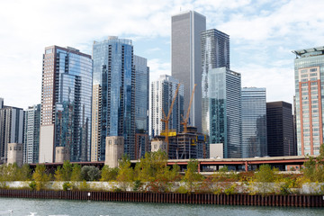 Obraz premium Chicago city skyline as seen from Lake Michigan, with construction site in foreground