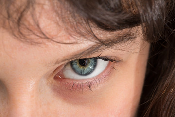 Macro of girl blue eye