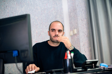 Caucasian businessman working on computer