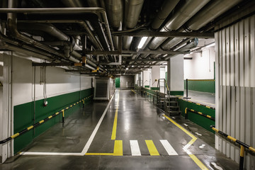 Industrial interior of modern plant with pipeline and corridor