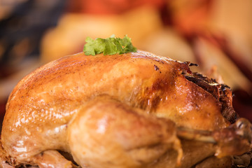 close up of fresh roast chicken against american flag background